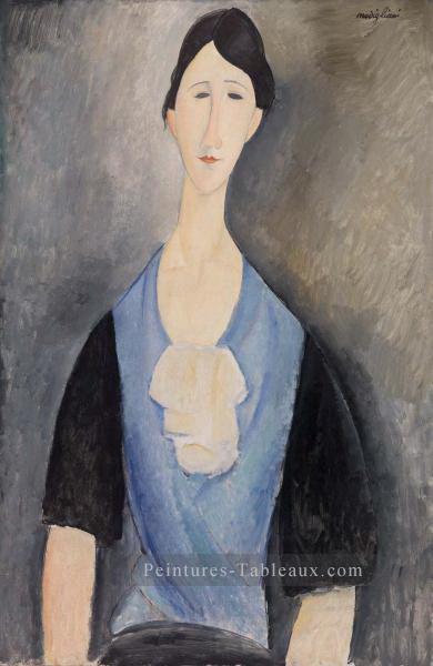 jeune femme en bleu Amedeo Modigliani Peintures à l'huile